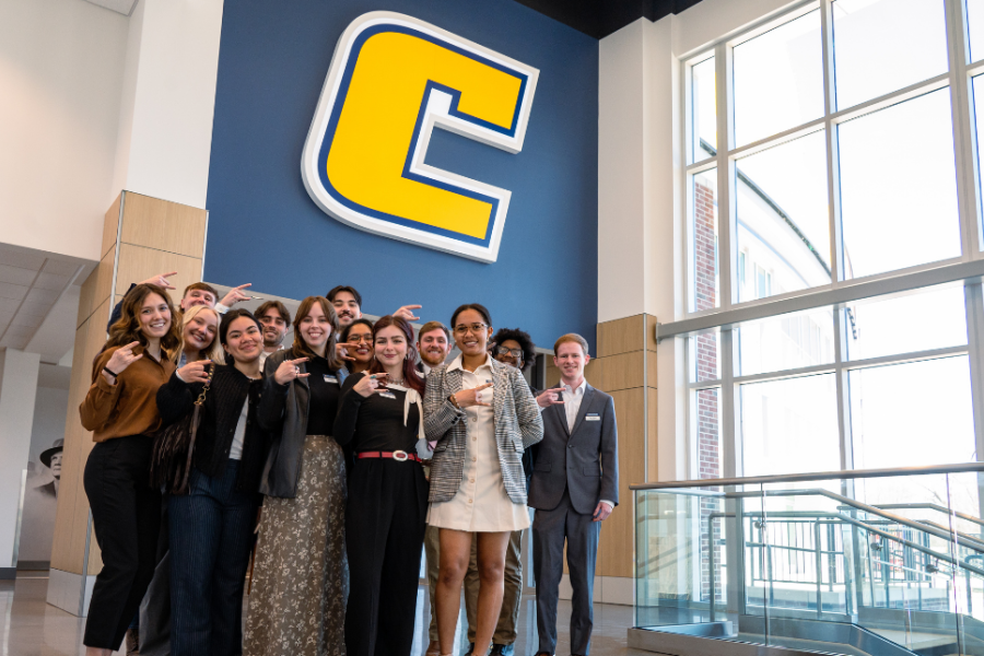 Rollins College of Business students showing the Power C