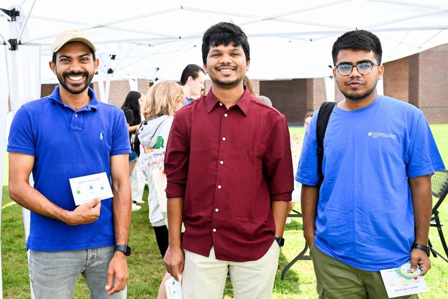 Three UTC male students participating in welcome week activities