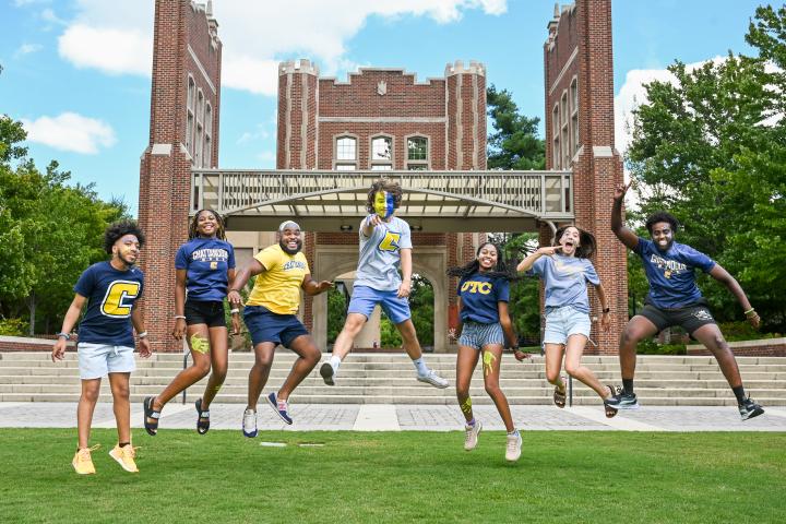 UTC Free Application Week Excitement UTC Students with painted faces jumping