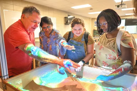 UTC Geology Students with a virtual map