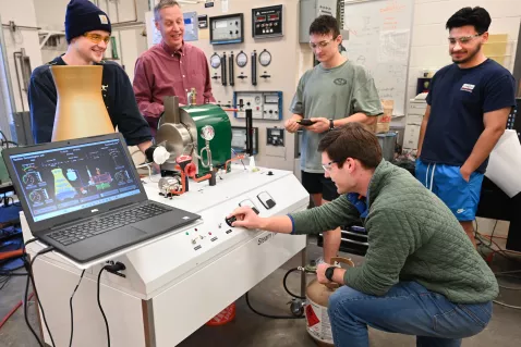 UTC Mechanical Engineering students using a machine table