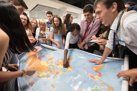 UTC Political Science and Public Service students looking at a map